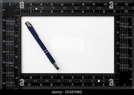 Blue pen and carpenter's square to personalize with the logo of your company over white background Stock Photo