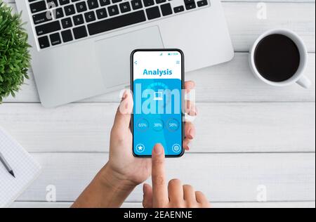 Unrecognizable woman using smartphone with data analysis app on screen, collage Stock Photo