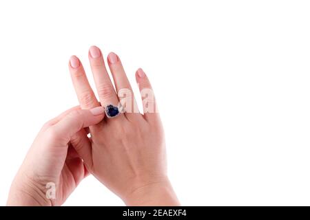 Heart shaped blue sapphire precious ring on woman hand isolated on ...