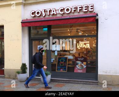 Cracow. Krakow, Poland. Costa Coffee logo on the facade of its local cafe Stock Photo