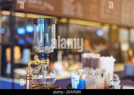 Aeropress Coffee and Glass Pot Close-up: Barista Press To Device and Coffee  Drops Pours Trought Aeropress To Pot Stock Photo - Image of method, coffee:  222093800