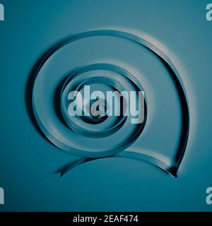 selective focus photo of iron spiral on a blue background Stock Photo