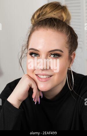 19 Year Old Pretty Woman, Smiling and Looking at Camera, USA Stock Photo