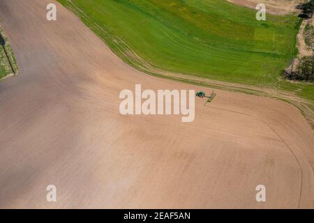 Farmers plant and spray on their fields in rural Wisconsin. Stock Photo