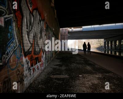 Stretford, Manchester, UK. 9 February 2021. Path used by walkers, runners and cyclists near the Bridgewater Canal. Credit: Julian Brown Stock Photo