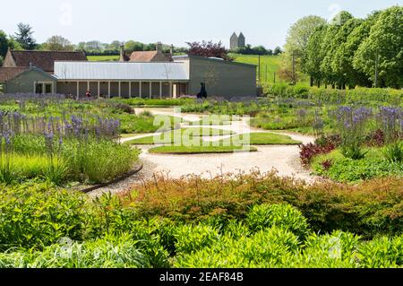 The Oudolf Field garden at Hauser and Wirth Art Gallery at Bruton in Somereset UK with the dovecote on the distant hill Stock Photo