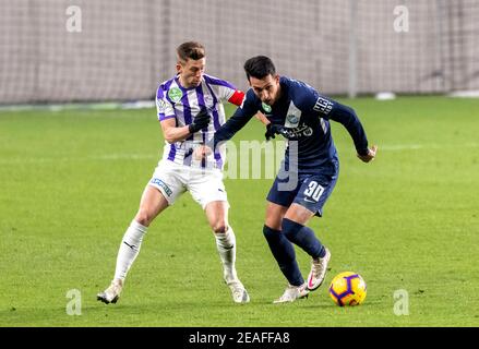 BUDAPEST, HUNGARY - MAY 27: (r-l) Endre Botka of Ferencvarosi TC challenges  Krisztian Simon of Ujpest FC during the Hungarian OTP Bank Liga match  between Ujpest FC and Ferencvarosi TC at Ferenc