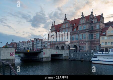 Gdansk, Poland - 05.06.2017: Cityscape of a Baltic sea port viewed from wooden walk by the canal. Traditional colorful houses in Gdansk, Poland. Stock Photo