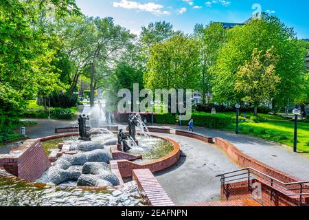 Gauklerbrunnen fountain in Stadtpark in Dortmund, Germany Stock Photo