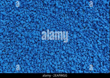 Decorative blue painted gravel for garden decoration and landscaping Stock Photo