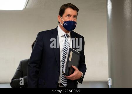 United States. 9th Feb, 2021. Sen. Bill Haggerty, R-Tenn., walks through the Senate subway on the first day of former President Donald Trump's second impeachment trial at the U.S. Capitol in Washington on Tuesday, Feb. 9, 2021. Trump is charged with “incitement of insurrection” after his supporters stormed the Capitol in an attempt to overturn November's election result. Credit: Caroline Brehman/Pool Via Cnp/Media Punch/Alamy Live News