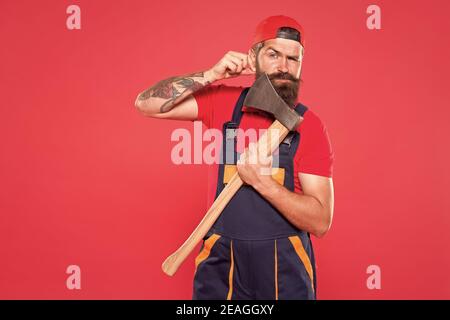 follow his style. Bring more style for bearded face. man worker hold axe. cut his beard. lumberjack carry ax. employee with axe. mature man ready for hiking. Cutting or wood chopper with sharp blade. Stock Photo