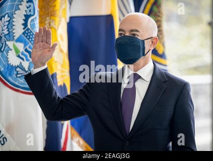 U.S Homeland Security Secretary Alejandro Mayorkas, takes the oath of office during an arrival ceremony at DHS Headquarters February 2, 2021 in Washington, DC. Stock Photo