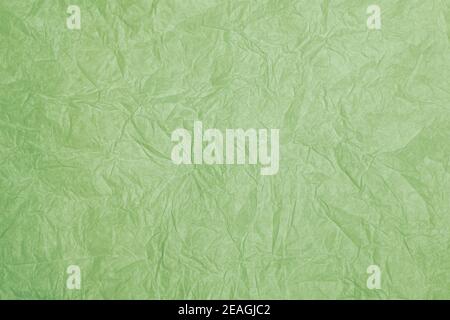 Old crumpled green paper background texture Stock Photo