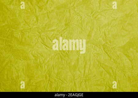 Old crumpled yellow paper background texture Stock Photo