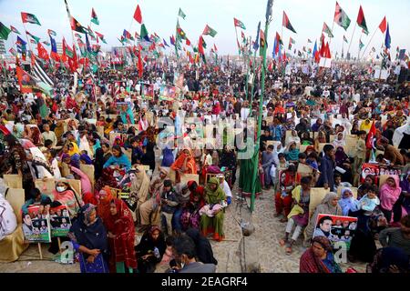 Hyderabad, Pakistan. 09th Feb, 2021. A view of a large number of different political and religious parties workers take part in the PDM public gathering at Hatri by pass Hyderabad. (Photo by Jan Ali Laghari/Pacific Press) Credit: Pacific Press Media Production Corp./Alamy Live News Stock Photo