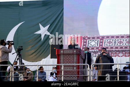 Hyderabad, Pakistan. 09th Feb, 2021. PML-N leader Shahid Khakan Abbasi addressing his speech in PDM public gathering at Hyderabad (Photo by Jan Ali Laghari/Pacific Press) Credit: Pacific Press Media Production Corp./Alamy Live News Stock Photo