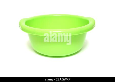Green plastic bowl isolated on white background Stock Photo