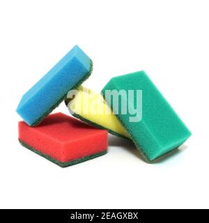 Multicolored sponges for washing dishes isolated on white background Stock Photo
