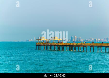 view of a pier penetrating into the sea in Kuwait Stock Photo