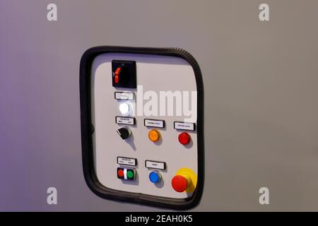 Control panel with push buttons and switches. Selective focus. Stock Photo