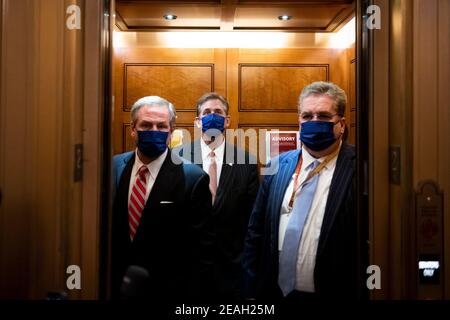 Washington, United States Of America. 09th Feb, 2021. Bruce Castor, defense attorney for former President Donald Trump, center, boards an elevator and makes his exit at the end of the first day of the second Senate impeachment trial of former President Donald Trump at the U.S. Capitol in Washington, DC, Tuesday, February 9, 2021. Credit: Rod Lamkey/CNP | usage worldwide Credit: dpa/Alamy Live News Stock Photo