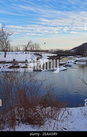 PATERSON, NJ -6 FEB 2021- Winter view of the Great Falls of the Passaic River, part of the Paterson Great Falls National Historical Park in New Jersey Stock Photo