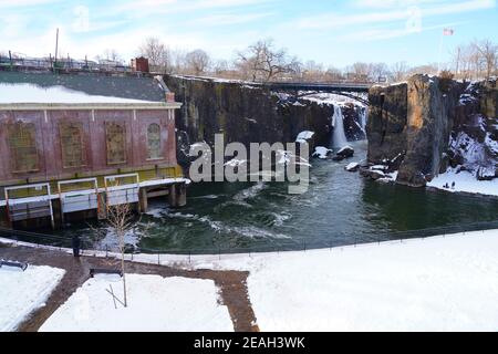 PATERSON, NJ -6 FEB 2021- Winter view of the Great Falls of the Passaic River, part of the Paterson Great Falls National Historical Park in New Jersey Stock Photo