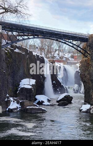 PATERSON, NJ -6 FEB 2021- Winter view of the Great Falls of the Passaic River, part of the Paterson Great Falls National Historical Park in New Jersey Stock Photo