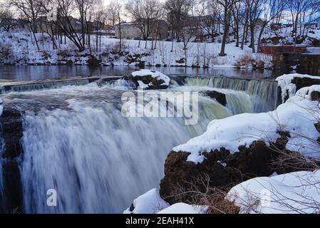 PATERSON, NJ -6 FEB 2021- Winter view of the Great Falls of the Passaic River, part of the Paterson Great Falls National Historical Park in New Jersey Stock Photo