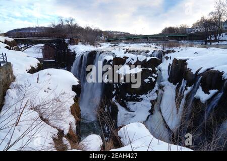 PATERSON, NJ -6 FEB 2021- Winter view of the Great Falls of the Passaic River, part of the Paterson Great Falls National Historical Park in New Jersey Stock Photo