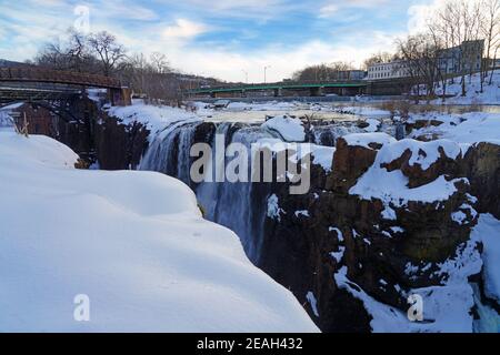 PATERSON, NJ -6 FEB 2021- Winter view of the Great Falls of the Passaic River, part of the Paterson Great Falls National Historical Park in New Jersey Stock Photo