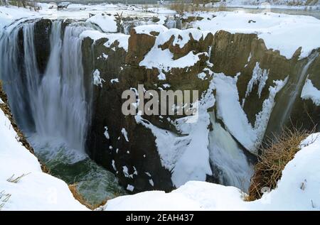 PATERSON, NJ -6 FEB 2021- Winter view of the Great Falls of the Passaic River, part of the Paterson Great Falls National Historical Park in New Jersey Stock Photo