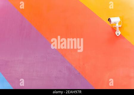 CCTV on a colorful wall Stock Photo