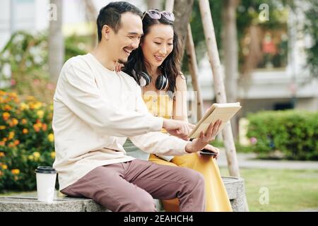 Couple watching video on tablet Stock Photo