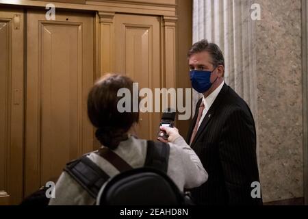 Bruce Castor, defense attorney for former President Donald Trump talks with a reporter as he waits for an elevator outside the Senate chamber, at the end of the first day of the second Senate impeachment trial of former President Donald Trump at the U.S. Capitol in Washington, DC, USA, Tuesday, February 9, 2021. Photo by Rod Lamkey/CNP/ABACAPRESS.COM Stock Photo