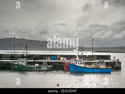 Ahakista, Cork, Ireland. 09th February, 2021. Fishing boats tied up at a pier in the coastal village of Ahakista in Dunmanus Bay, Co. Cork, Ireland. - Credit; David Creedon / Alamy Live News Stock Photo