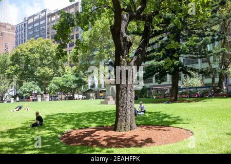 Wynyard Park in Sydney city centre, with office workers enjoying a rest on a summers day,Sydney,NSW,Australia Stock Photo