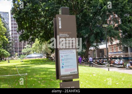 Wynyard Park in Sydney city centre, city of Sydney council welcome sign and covid rules,Sydney,Australia Stock Photo