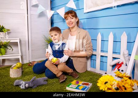 Birthday boy and his mommy. Young woman celebrating Birthday her son. Stock Photo