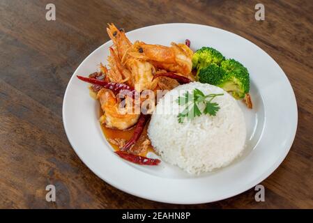 Steam rice with deep fried prawns in tamarind source one of delicious Thai food Stock Photo