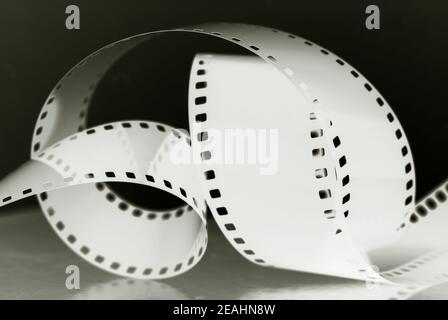 35mm negative film roll in blur. Photographic film. Stock Photo