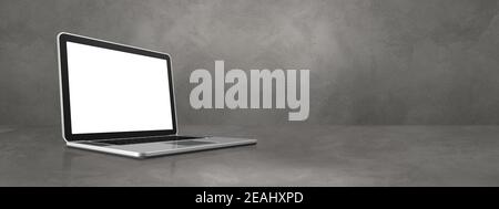Laptop computer on concrete office scene background banner Stock Photo