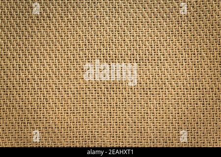 Mesh cloth speaker brown fabric detail of the amplifier. Stock Photo