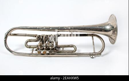 silver trumpet isolated on a white background. Musical instrument Stock Photo