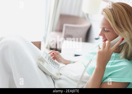 Woman in hotel room. Service in hotels and inns Stock Photo
