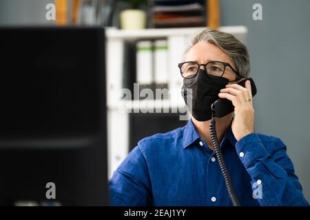 Business Man Talking On Phone Or Telephone Stock Photo