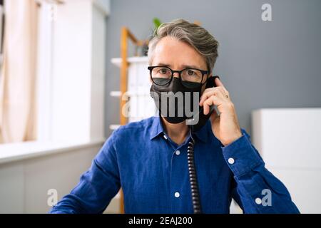 Business Man Talking On Phone Or Telephone Stock Photo