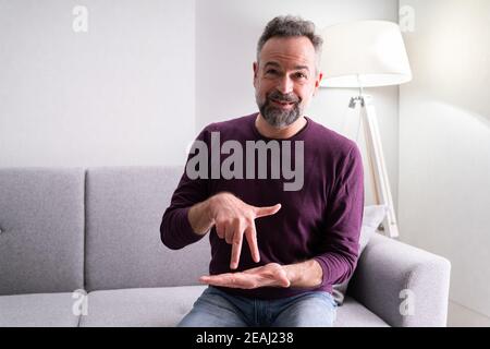 Senior Learning Sign Language Stock Photo