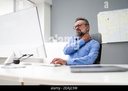 Ageing Senior Neck Pain And Ache Stock Photo